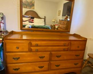 Crawford Furniture with beautiful design cut out on both sides of the dresser