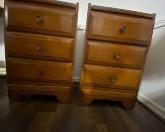 Crawford Furniture with a cutout design on both sides of the nightstands.