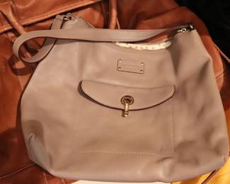 Kate Spade New York creamy peach colour shoulder bag with silver hardware and navy polkadot interior
