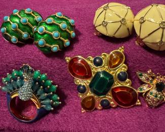 Kate Spade peacock ring, Jay Strongwater brooch. Finer earrings