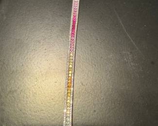 14 karat gold, diamond, and rainbow gemstones tennis bracelet