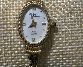 14 K yellow gold, Michael Anthiny women’s watch