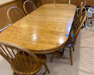 Athol Solid wood 8 foot table (68” wo leaves)
-2 x14 inch leaves
-Leaves store inside the table! 
-6 chairs