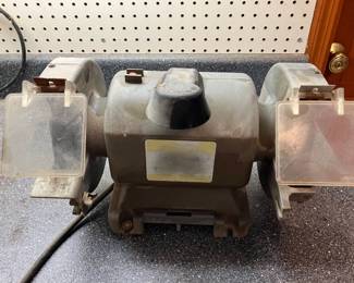 Lot 021-GAR: Vintage Craftsman Bench Grinder

Features: 
•	Model 397.19320
•	6” grinding wheels


Condition: Fair working condition (we briefly powered it on). Needs a new 6W light bulb. Missing a guard/guide on the RH side.
