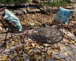 Lot 086-PAT: Wrought-Iron Bistro Set

Features: 
•	Reddish-Brown wrought-iron Bistro table and 2 matching chairs
•	Pillows included


Dimensions: 
•	Table: 23” top diameter x 16”H
•	Chairs: 15” diameter (seat) x 16”H (seat from ground)


Condition: Solid pieces. Paint is chipped and weathered. Overall good pre-owned condition.

