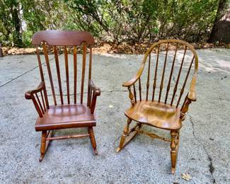 Lot 027-GAR: Rocking Chair Duo

Features: 
•	Chair on the Left: A tall-back spindle rocking chair with a slightly-curved headrest and slender armrests, showcasing a more traditional, straight-lined silhouette and sporting a darker finish.
•	Chair on the Right: A Windsor-style rocking chair with a lighter finish, with a rounded back and gently curved spindles, complemented by turned legs and arm supports, giving it a warm, farmhouse appeal.
Dimensions: 
•	The dark-stained rocker is 23.5”W x 18.5”D (seat) x 42.5”H
•	The Windsor-style rocker is 24”W x 19.25”D (seat) x 41”H

Condition: Both are very sturdy. Finishes look good and there are no visible blemishes. Overall, both are in Very Good pre-owned condition.
