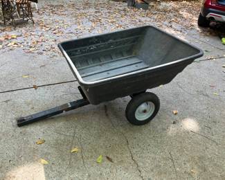 Lot 059-GAR: Towable Garden Cart

Features: Ready to hitch to your lawn tractor, this garden cart will make you a true backyard weekend warrior!
•	Heavy-duty poly construction
•	Pneumatic tires
•	Metal frame

Dimensions: 46”L x 38”W x 12”D (approximately 12 cu. ft. of capacity)

Condition: Good pre-owned condition. Note rust spots on trailer tongue; some spots on the tongue may have previously been welded/repaired.
