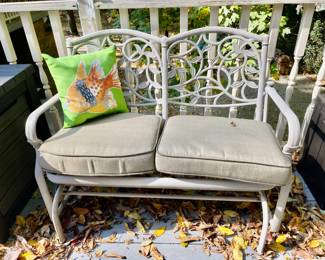 Lot 075-PAT: Patio Glider

Features: 
•	Hampton Bay metal patio glider
•	Includes cushions and pillows

Dimensions: 42.5”W (seat) x 19”D (seat) x 21”H (w/cushion)

Condition: Good pre-owned. Some blemishes are visible on finish and glider needs to be cleaned.

