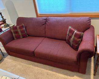 Simmons burgundy sleeper sofa: 85 x 34 x 35 inches