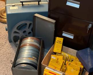 Vintage 16mm projector and films.