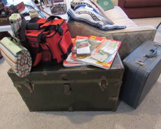 Old truck and suitcase. Picnic gear.