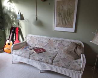 Vintage white wicker couch and matching large round coffee table