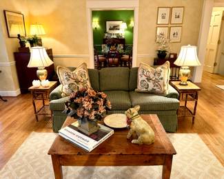 $500  - Custome Upholstered Sofa with 3 loose top and bottom cushions, roll arms, and skirt. 75x37x34