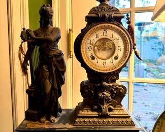 $1200 - Ansonia Clock Company, two dates listed: dated 6/14/1881, patented 6/13/1882 Cast iron (missing left handle) 19.5 x 8.5 x 22. Chipping present on base. 