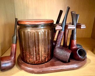 $50.  Pipes and holder.