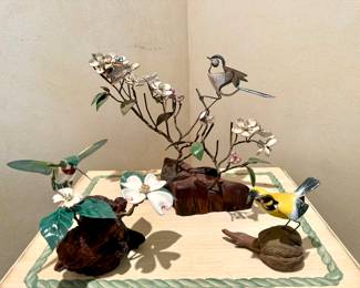 $100.  Norman Brumm bird sculpture 13” x 11”.                   $60 “Humming bird”. Norman Brumm sculpture 7” x 7”.  $24  As Is.  “yellow bird”  Norman Brumm 