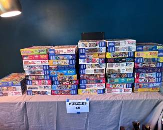 So many puzzles! Some new in packaging