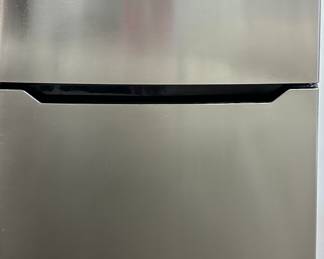 Full size new insigna fridge 
Opens left to right 