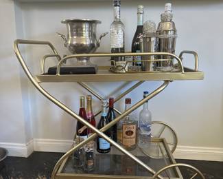 Gold bar cart with glass shelves 
