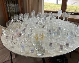 crystal stemware and glasses. Many as sets