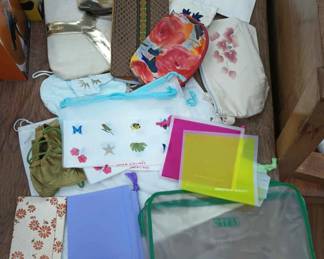 CIP028 - Lot of cosmetics bags, yves saint laurent perfumes, discolored