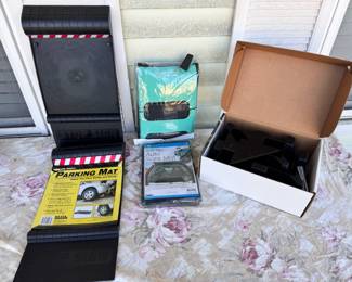 Car Accessories
Includes - parking mat x2, anti slip trunk mat, a single seat cover, and a weather guard cargo tech (all parts in original box). 