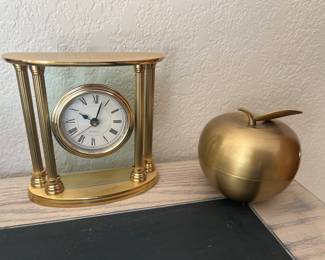 Solid gold-plated quartz clock.
Brass Apple opens to gold jewelry or trinkets.