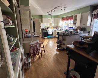 Kitchen located through the dining room, or the den