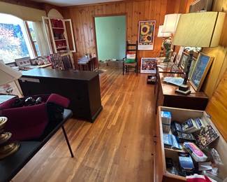 Den, located straight down the hall from the front door entrance. 