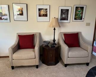 Neutral upholstered chairs
Accent pillows