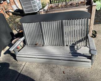 Porch swing- I think it’s a composite- not wood
