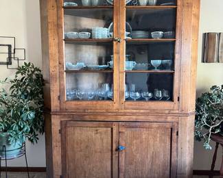 Large antique corner cabinet. Please note- this is a corner cabinet. Filled with opalescent hobnail glassware