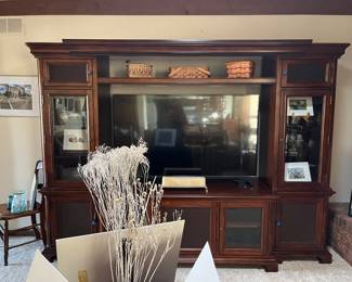 Nice Entertainment Center and TV for sale. Entertainment center dismantles in sections for ease of moving