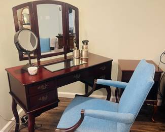 Queen Anne style vanity with mirror and federal style armchair