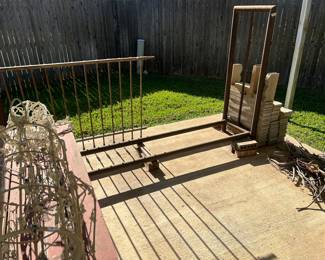 Firewood rack, iron fence, concrete garden stones