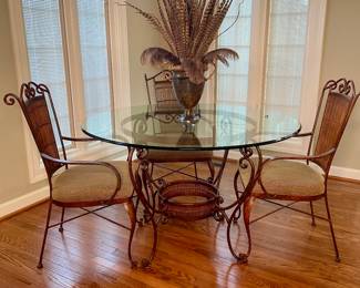 Glass top wrought iron dinette set w/ 4 armchairs 