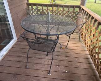 WROUGHT IRON TABLE AND CHAIRS