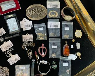 Sterling Spirit of Detroit Charm (A), Sterling Spirit of Detroit Charm (B), Harley Davidson 90th Anniversary Zippo, Vintage Sterling Bow Brooch, 14k Detailed Hoop Earrings (BL), 14k Green Stone Earrings (BL)
