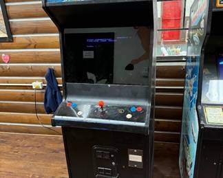 Vintage arcade game as-is located in another building onsite. $200