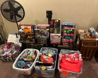 TV stand available 
Toys 
Bucket of clothes for $.25
