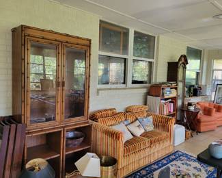 Vintage Sofas, Bamboo Cabinet, Brass lamps, Books