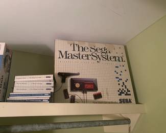 The sega master system with several games 