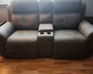 New Leather Reclining Loveseat