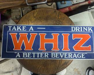 Whiz metal sign 