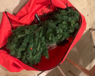 Just in time for the holidays…7 1/2 ft skinny Christmas tree - prelit white lights with metal stand a red storage bag