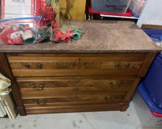 Three drawer walnut Victorian style chest with perfect marble top. Missing handle hardware in drawer.