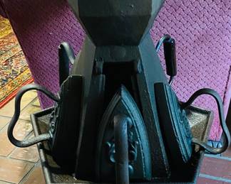 early French laundry Stove with all original sad irons--the top would hold a hot water kettle.  The coal bin that is listed on this site should sit beside this little laundry stove (a favorite)