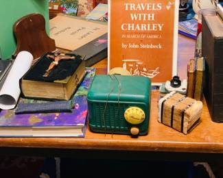 great books and religious items.  The Steinbeck book is a first edition large print