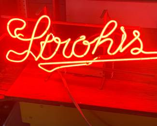 One of two neon Strohs beer signs. 