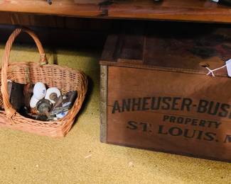 Anheuser Busch beer crate and a basket of door knobs 